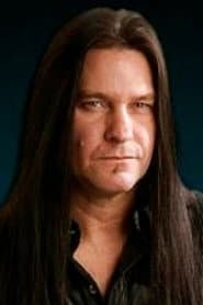 Shawn Drover dans le rôle de Drums