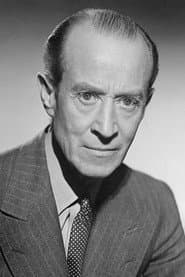H.B. Warner dans le rôle de Mr. Gower