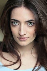 Anabel Kutay dans le rôle de April