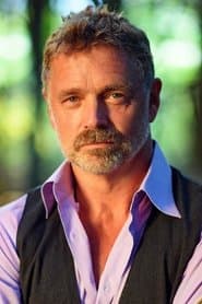 John Schneider في دور Dispatcher