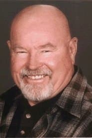 Charles Cyphers dans le rôle de Harvey McGill