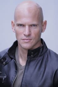 Andrew Miller dans le rôle de Agent Vaughn