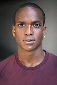 Emmanuel Okoye dans le rôle de Maths Teacher