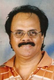 Crazy Mohan في دور Parthasarathy