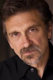Dennis Boutsikaris dans le rôle de Ward
