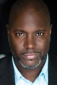 Marc-Anthony Massiah في دور Security Guard #2