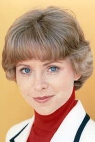 Lauren Tewes as TV Anchorwoman