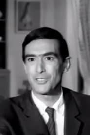 Giannis Kostis as hotel maitre