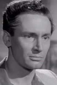 William Dexter dans le rôle de Dress Shop Owner