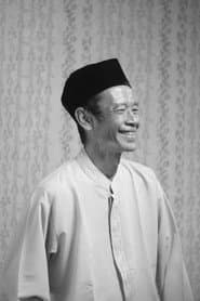 Sujono في دور Pak Dhe Senen / Tulus's Uncle
