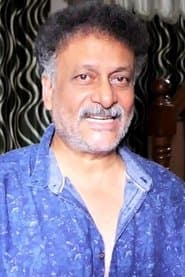Surya Bhagawan Das dans le rôle de Indu's father