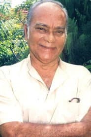 Henry Jayasena في دور Village Headsman