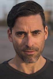 Adam Daniel Mezei في دور Sam Tilner
