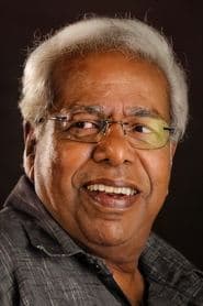 Thilakan as Menon