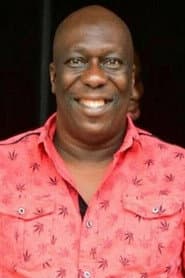 Charles Awurum dans le rôle de Theo