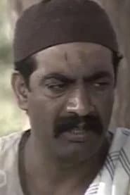 Mohamed Abdel Razek dans le rôle de The Janitor