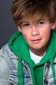 Ronan Carroll في دور Phil Robertson, age 12