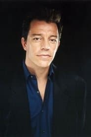 Michael Wiseman dans le rôle de Travis