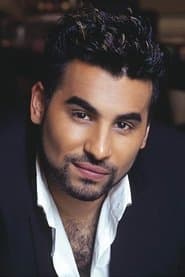 Ameet Chana dans le rôle de Bob Anand