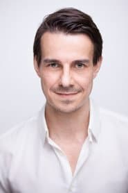Philipp Baltus في دور Tom