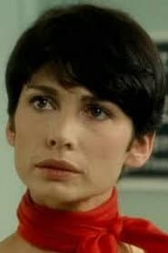 Michèle Sand as Nicole Perrin, wife of François