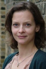 Julie Cox dans le rôle de Michelle Whitman