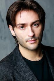 Richard Follin في دور Zach