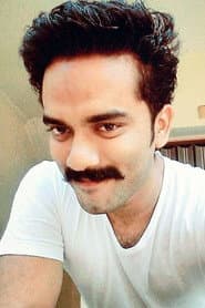 Ashiq Ameer dans le rôle de Karthik
