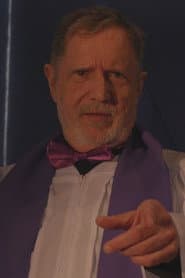 Rick Boardman في دور Reverend Charles Le Verrier