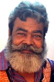 Anupam Shyam dans le rôle de Priest