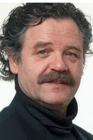 Gunter Berger dans le rôle de Inspector Higgins
