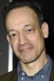 Ted Raimi dans le rôle de Alex Jones