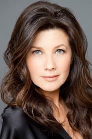 Daphne Zuniga dans le rôle de Michelle Andrews