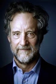 John Rothman dans le rôle de Aurora Exec. Officer