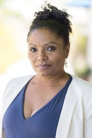 Vanita Harbour dans le rôle de TV Host