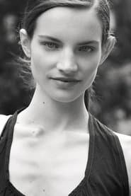 Victoire Dauxerre as Receptionist #1