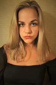 Shelby Armstrong في دور Caitlyn Sparks