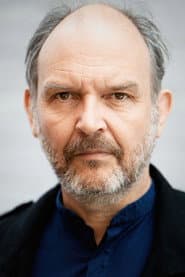 Ingo Ospelt as Investigating Judge