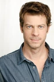 Eric Paul Erickson dans le rôle de Alley Jaws