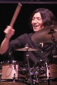 Yuhei Matsuoka dans le rôle de Drums
