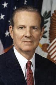James Baker III dans le rôle de Self
