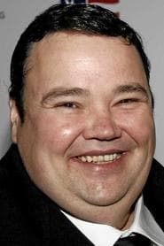 John Pinette dans le rôle de Sam Delance