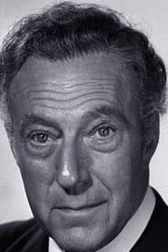 Richard Caldicot dans le rôle de Lord Russell