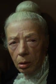 Ester Carloni as Maria, tobacco seller
