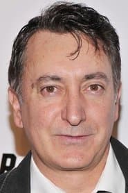 Peter Kelamis as Officer Burt