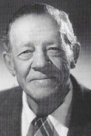 Tom London في دور Banker