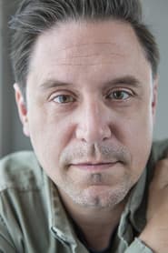 James Rich as Dennis