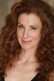 Suzie Plakson في دور Senior Flight Attendant