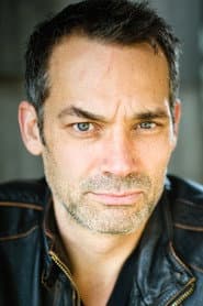 Todd Thomson في دور Reverend