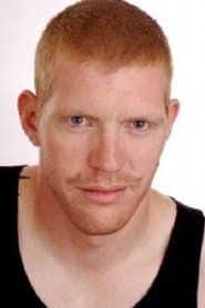 Reuben De Jong في دور Father (Suit)